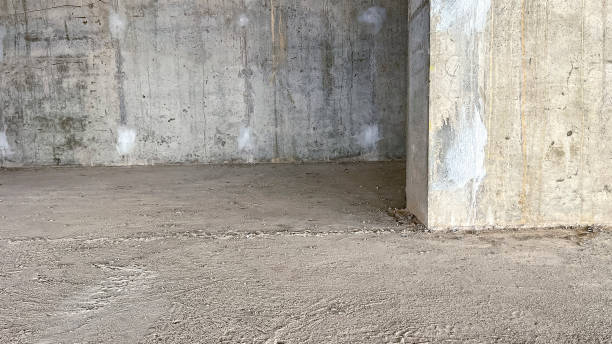 istock Textured concrete wall floor, concrete floor with concrete wall, gray gray stone texture concrete wall wallpaper tile background panorama banner, industrial concrete stage with floor and back wall 1960063320