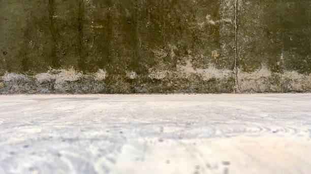 istock Textured concrete wall floor, concrete floor with concrete wall, gray gray stone texture concrete wall wallpaper tile background panorama banner, industrial concrete stage with floor and back wall 1960063322