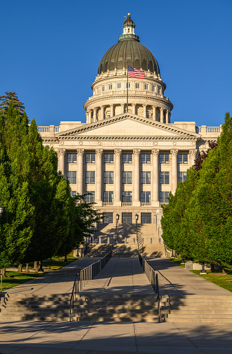 Utah State Capitol building on a sunny day in Salt Lake City, UT. The capitol is the main building of the Utah State Capitol Complex, which is located on Capitol Hill.