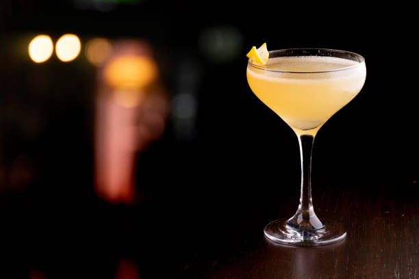 istock refreshing cocktail glass of shaken vodka with lime blurred pub background 1960148042