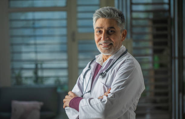 istock Old healthcare worker in clinic 1960148632
