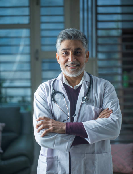 istock Old healthcare worker in clinic 1960158878