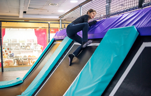 Young girl enjoy playing in full equipped playground