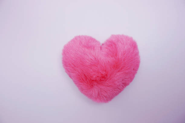 istock Heart figure top view on pink background 1960166004