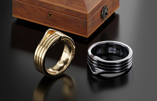 Gold and platinum rings on black background, Modern and retro style ring design ideas. 3D render.