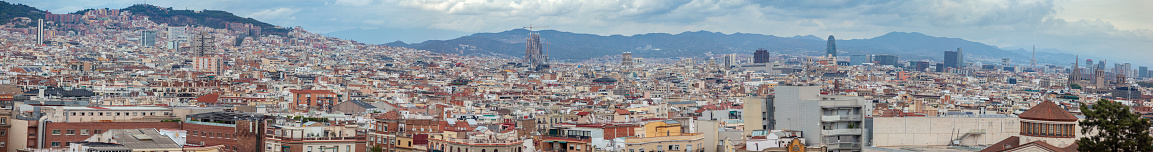 Catalonia, panorama of Barcelona, the whole city, view of the city from the mountain, huge panorama, cityscape, spiritual symbol, religious center of Catalonia, pilgrimage, Catholic, towers, temple, church, religion, art, modern European city, churches, houses, streets