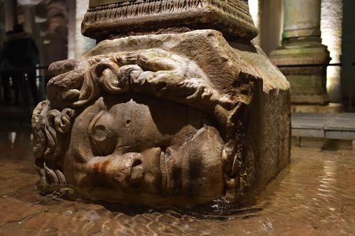 Istanbul, Turkey â 8 December, 2023: Medusa head shown in the Basilica Cistern.  Head was recycled form an antique building of the late Roman period