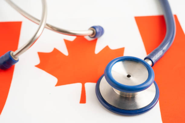 istock Stethoscope on Canada flag background, Business and finance concept. 1960189983