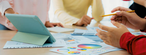 istock Creative design team discusses about interior design at meeting. Variegated. 1960194842
