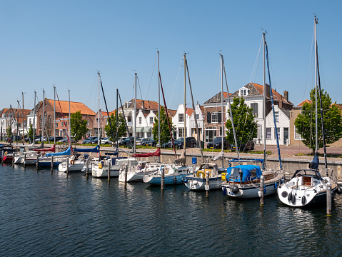 Marina with yachts in old harbour, Oude Haven, in old city of Brouwershaven, Schouwen-Duiveland, Zeeland, Netherlands