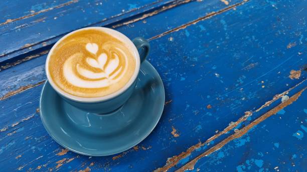 istock Top view of hot vanilla coffee latte and empty space for text on right side. 1960216891