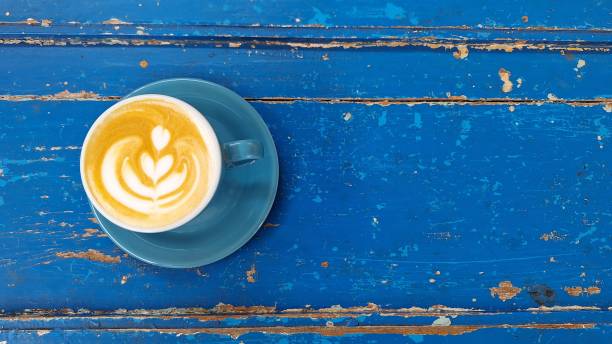 istock Top view of hot vanilla coffee latte and empty space for text on right side. 1960216905