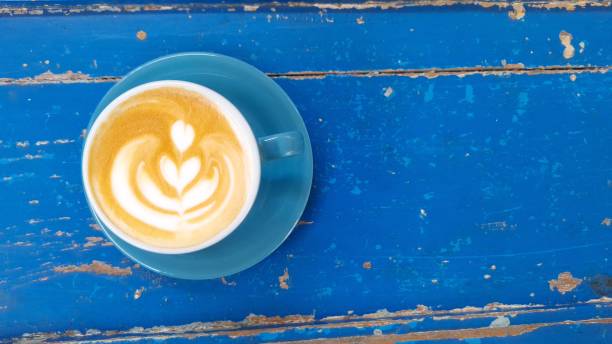 istock Top view of hot vanilla coffee latte and empty space for text on right side. 1960217416