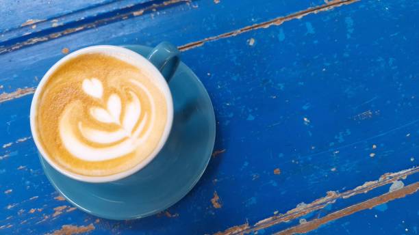 istock Top view of hot vanilla coffee latte and empty space for text on right side. 1960217422