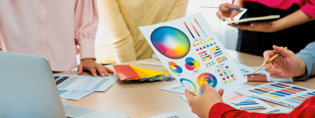 istock Interior designer discuss the color material with her colleagues. Variegated. 1960246110
