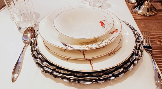 Empty serving plates on the table