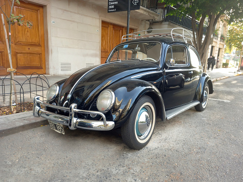 An old black car parked in an Havana street, Cuba