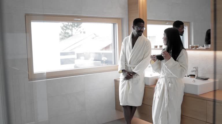 Couple Enjoying Morning Routine in Bathroom