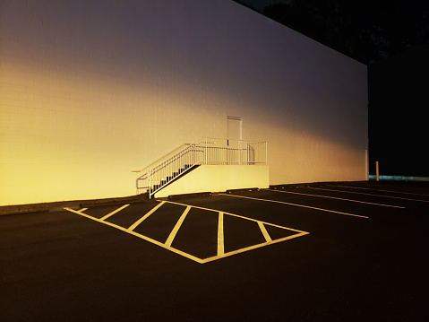 Background image of a Warehouse Back door and Parking Lot at Night, shot in Marietta, GA.