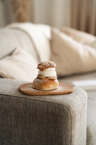 A variation on the traditional Swedish dessert known as Semla, always made and eaten on Fat Tuesday every year. A luxurious looking dessert with almond paste, whipped cream and decorated with chopped almonds and powdered sugar.