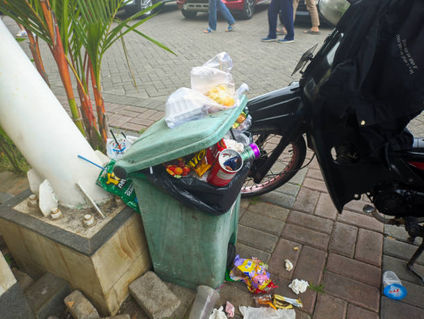 a trash can that is full of trash