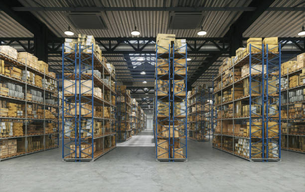 istock Products  at the warehouse hall. Horizontal camera view along the rows shelves with cardboard boxes in warehouse storage room. 1960322432