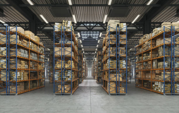 istock Products  at the warehouse hall. Horizontal camera view along the rows shelves with cardboard boxes in warehouse storage room. 1960322436