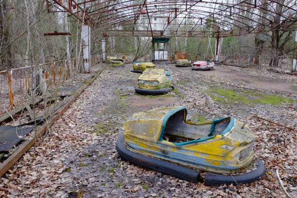 istock Cars in an abandoned amusement park in Pripyat. Rusty deserted attractions. 1960329671