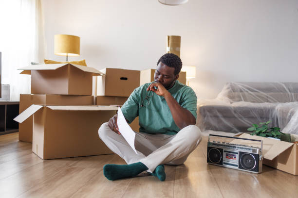 istock An upset African American young man is having financial problems - moving out 1960347558