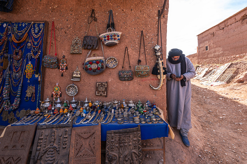 Ait Ben Haddou, Morocco - January 04, 2024: Selling souvenirs in the streets of the old town