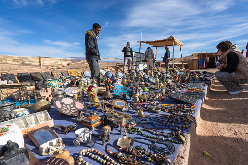 Atlas, Morocco - January 04, 2024: Roadside souvenir vendors in the Atlas Mountains