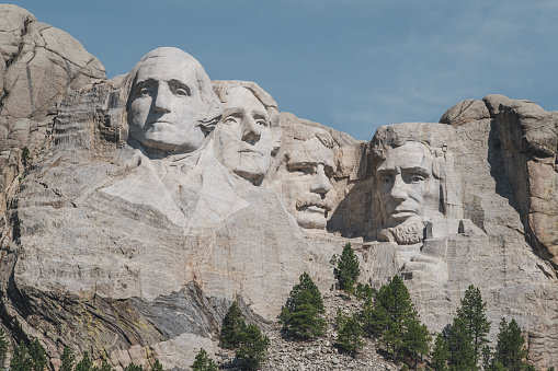 Close-up view of Mt. Rushmore, featuring the faces of four famous U.S. Presidents carved into the mountainside.