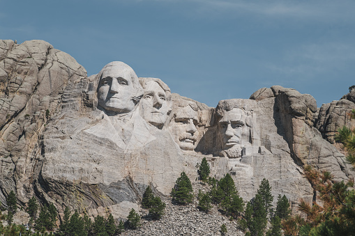 Close-up view of Mt. Rushmore, featuring the faces of four famous U.S. Presidents carved into the mountainside.