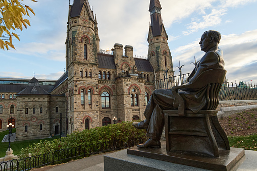 Ottawa, Ontario, Canada, 16th of October, 2023. Side view of the Lester B Pearson Monument and the House of Commons of Canada