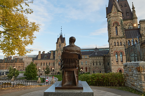 Ottawa, Ontario, Canada, 16th of October, 2023. Back view of the Lester B Pearson Monument and the House of Commons of Canada