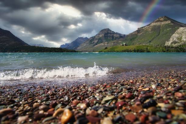 Elevated view of storm and rainbow over lake and desert landscape, Lake Roosevelt, Tonto Basin, AZ