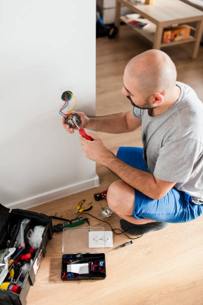 istock Fixing power outlet at home 1960413269