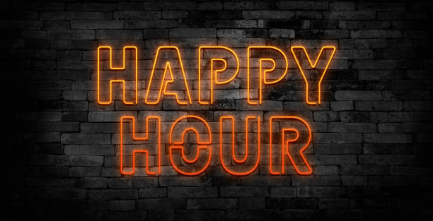 istock Happy hour neon sign on brick wall background. 1960427562