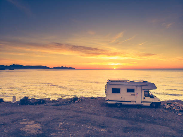 istock Caravan on sea coast at sunrise. Aerial view 1960449813