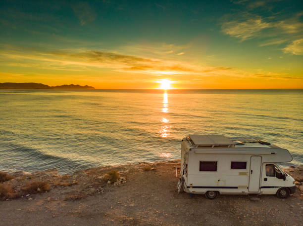 istock Caravan on sea coast at sunrise. Aerial view 1960449855