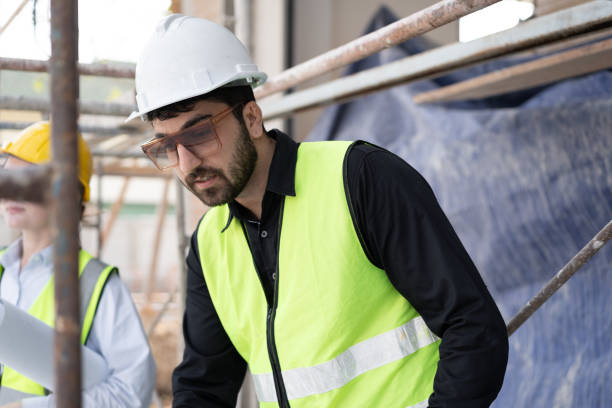 istock Portrait Caucasian engineer man working at construction site 1960526447