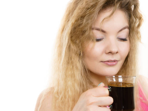 istock Positive woman drinking her morning coffee 1960536194