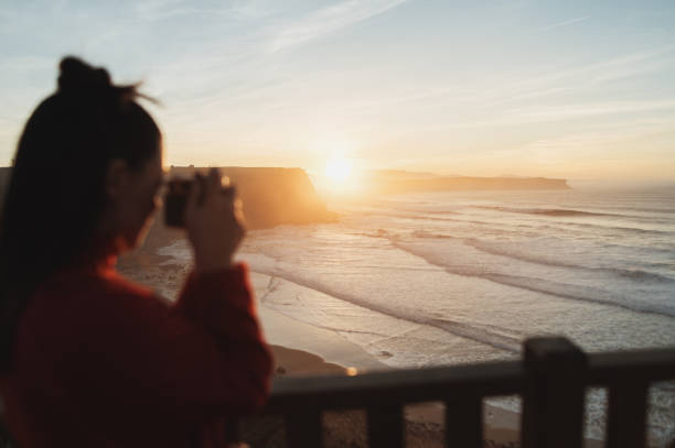 istock Taking a photo of a beautiful sunset 1960557885