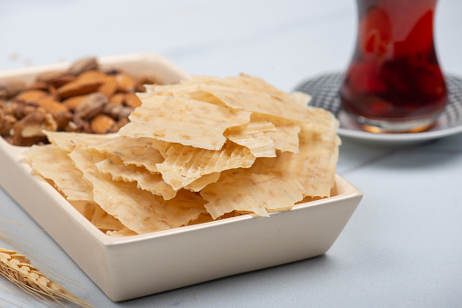 Tarhana chips, Turkish snack made with flour, wheat berries, mint, yogurt and spices also known as frik