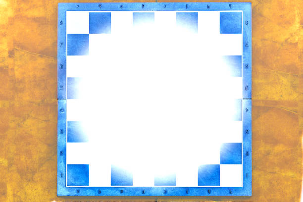 a square board divided into sixty four alternating dark and light squares, used for playing chess or checkers