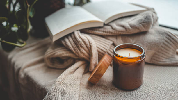 istock Burning candle in a cozy home interior 1960611193
