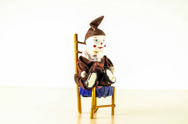 istock Pierrot toy doll on white background 1960617513
