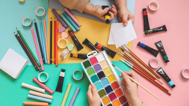 istock Back to school. Panoramic education banner. Top view, flat lay. Colorful supplies on table, colored paper. Children's creativity concept. Preschool study, development. Accessories for the schoolroom 1960619632