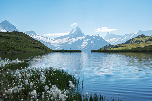 the Matterhorn Mountain in the swiss alps reflecting in mountain lake Riffelsee in the morning hour