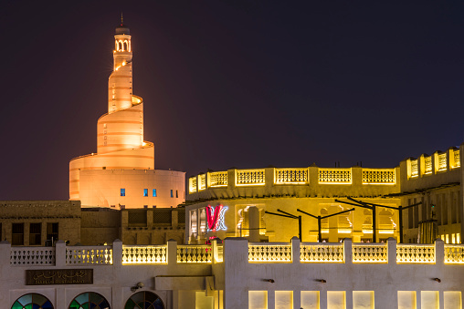 Doha, Qatar, April 22,2023: Night views of the traditional Arabic mosque architecture of Souq Waqif Market.